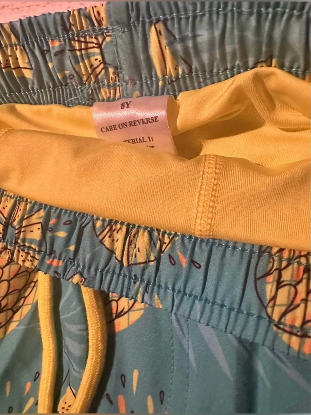 Kids Teal Pineapple Swim Trunks with Yellow Drawstring